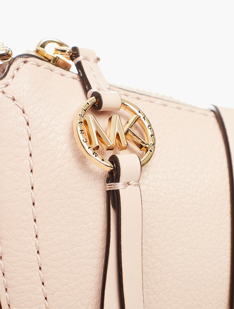 Shop Michael Kors Soft Pink Camden Leather Messenger Bag for Women from